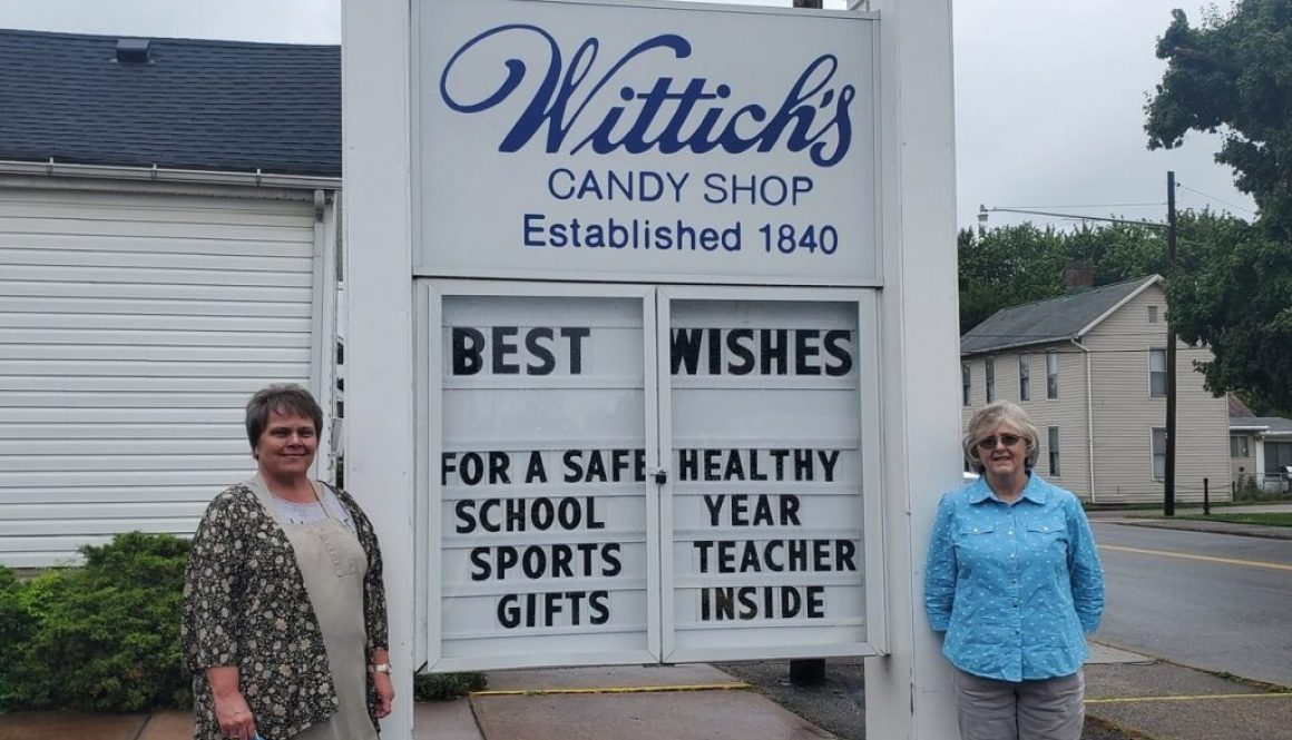 Janet Wittich and Tammy Ayers outside Wittich's Candy Shop