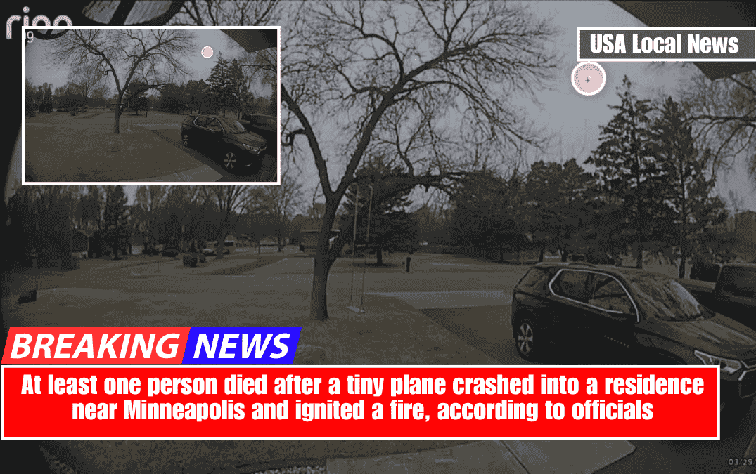 At least one person died after a tiny plane crashed into a residence near Minneapolis and ignited a fire, according to officials